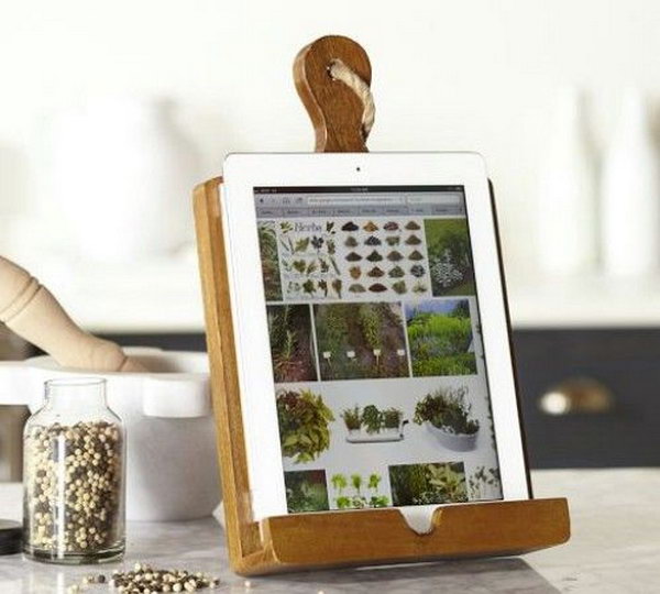 Kitchen Tablet Holder. This tablet holder would be a perfect present for your mom if she often need a tablet to try some new recipes in the kitchen. 