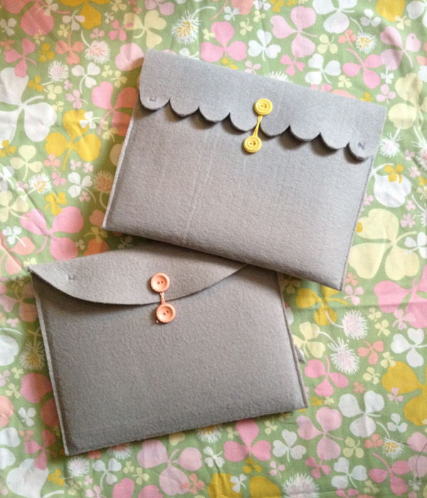 Felt iPad case. This is a super inexpensive way to get a custom iPad case with the materials, a piece of thick felt ,a pair of scissor, a sewing machine, needle and thread,two buttons,etc. that you can get around you.