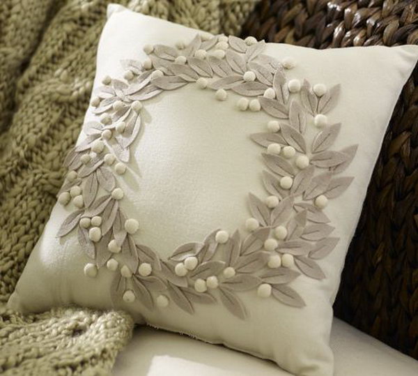Pottery Barn Pillow Knockoff: I can hardly tell what pillow is from pottery barn and what pillow is handmade by you. Look at the felt leaves and white cotton balls, I really love the simple beauty of this pillow! See the tutorial 