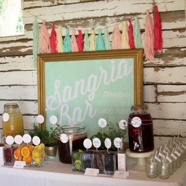 Sangria Drink Station. Beverage stations are a great way to offer tasty drinks besides the standard wine and juice to your guests. Add up a sign to draw attention to your sangria bar. The sign coordinates with the theme of this drink station perfectly.