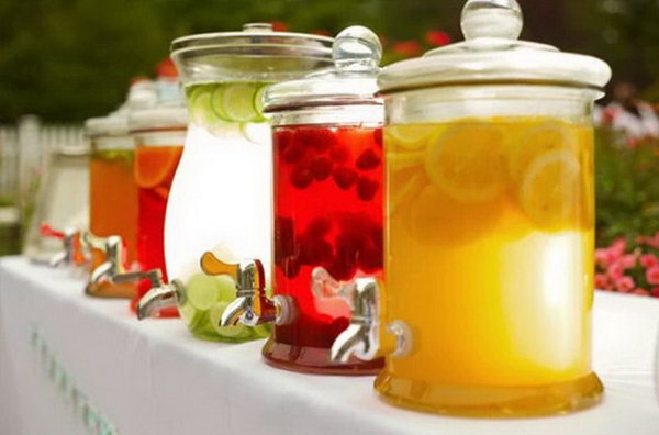 Clearly Cool Summer Drink Station. Bring into play the magic of clear jars en masse by filling them with jewel-bright concoction of your style and matching fruit. Your guests will be impressed by this cool summer flavor with no doubt.