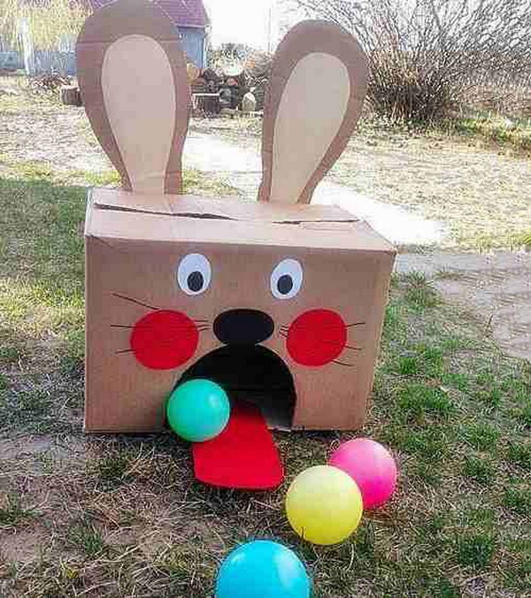 Easter Bunny Ball Toss Activity. Use a huge carton-box and make it into the Easter bunny shape. Leave a big fan-shaped hole and glue its tongue from red-painted cardboard. Stand five feet from the Easter Bunny carton and throw colorful balls toward it. Count how many balls you can throw in.