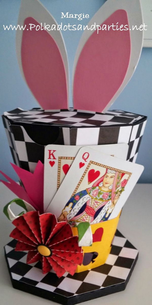 Easter Bonnets Inspiration Hat Box. This great inspirational hat box comes from Alice in Wonderland series. The playing card element adds a magic flavor to this cool hat box and the bunny ears at the top makes it funnier.