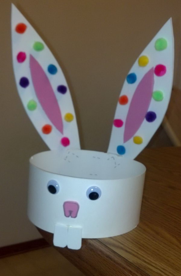 Simple Easter Hat. Make this hat with used buttons instead of pom poms. Make sure that you glue the ears on the back so they would stay straight with extra weight. Try to DIY such a simple Easter hat by yourself. It can bring your kid a lot of fun!
