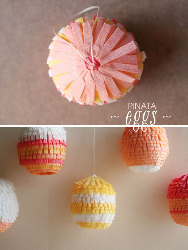 Cute Easter Pinata Eggs. DIY these pi?ata Easter eggs with blown-out jumbo chicken eggs, floral crepe paper, thread, glues and toothpicks. They are easy to make and will definitely brighten up your celebration.