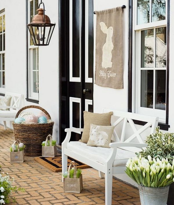 Easter Porch Decoration Idea. I appreciate this decoration style with amazing grace. Display some fresh plants and baskets filled with Colorful Easter eggs. You can enjoy the good time sitting on your armchair.