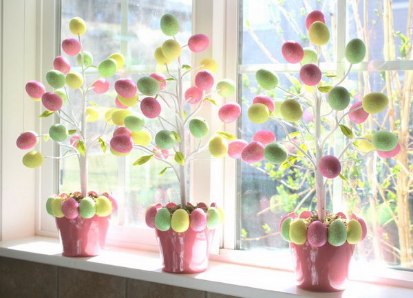 Target Dollar Egg Tree. To DIY this beautiful Easter egg tree, all you need is the Easter tree a pot and 2 boxes of foam glitter Easter eggs. These eggs are light-weight, you can pock them onto the branch even without gluing.