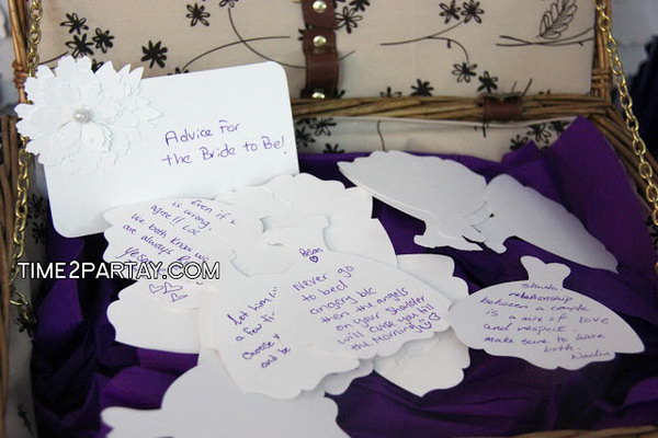Advice for the Bride-to-Be. All the guests can write down some suggestions to the bride to be on the dress shaped card. All the advices are kept in a suitcase for the bride-to-be’s retrieval.