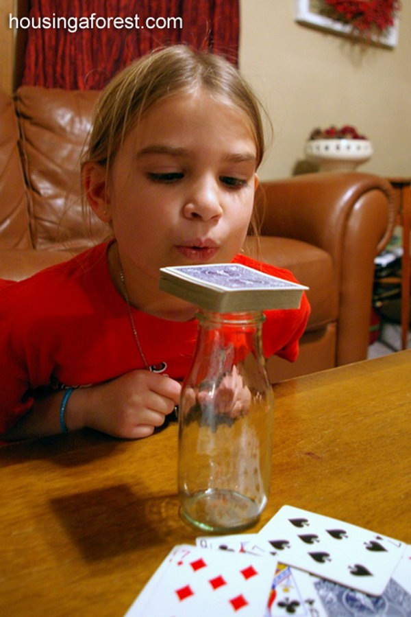 Don't Blow the Joker. Put playing cards on the top of a bottle, and try to blow it off one by one. This game is simple to play, which is part of the reason we love it so much.