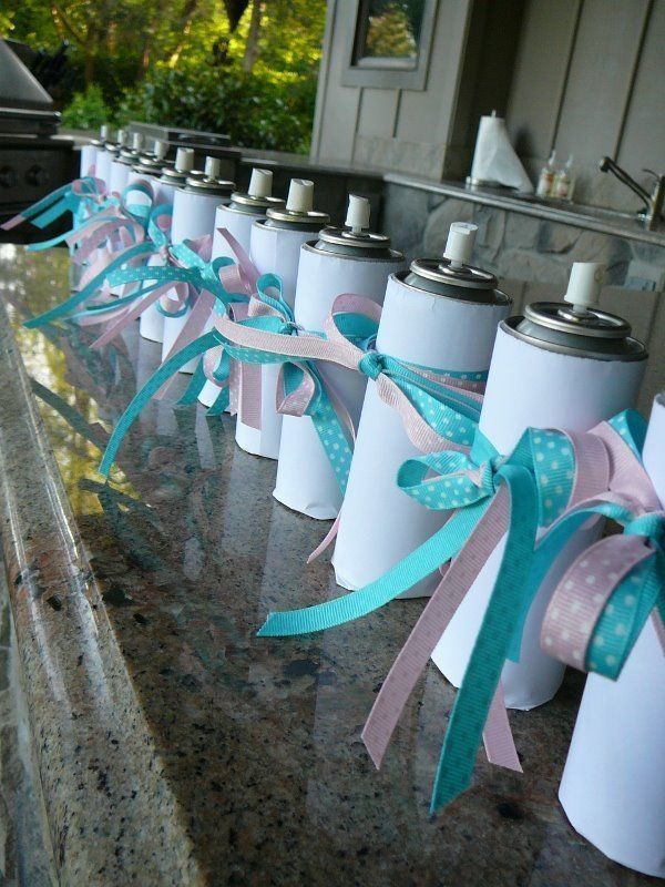 Silly String Gender Reveal Party. Wrap cans of blue or pink in white paper and decorate with pink and blue ribbon. Spray the strings to make the exciting discovery.