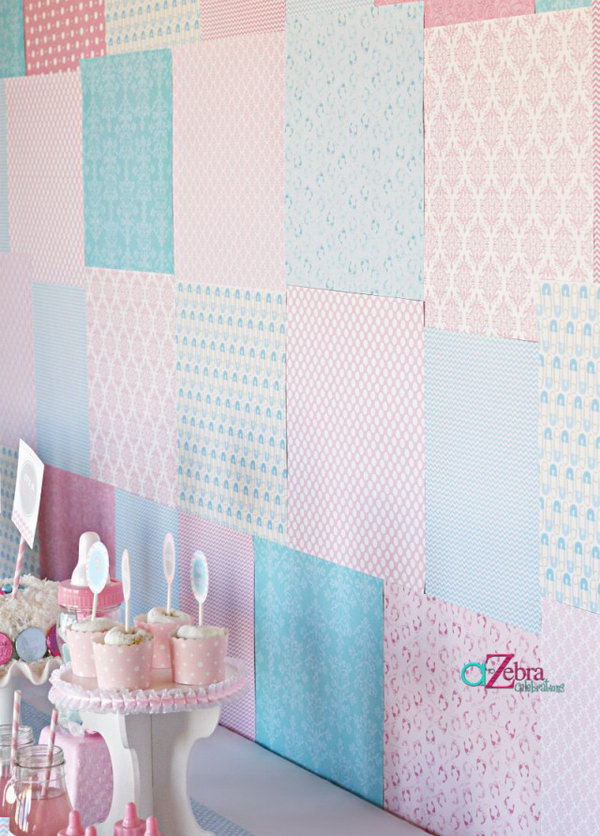 Gender Reveal Backdrop Party Idea. As usual, pink stands for a girl and blue stands for a boy.  Create such a gender reveal backdrop with scrapbook paper in beautiful patterns to get your party dolled up.