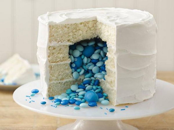 Gender Reveal Cake. Bake a gender reveal cake with a cascade of candy in the appropriate color inside to bring out the exciting news to all your friends and family members.