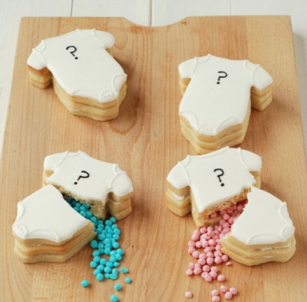 Gender Reveal Cookies. So many people are making efforts on cakes to make the announcement. Why not try something new by baking some stunning cookies with loads of tiny candies inside to make the announcement.