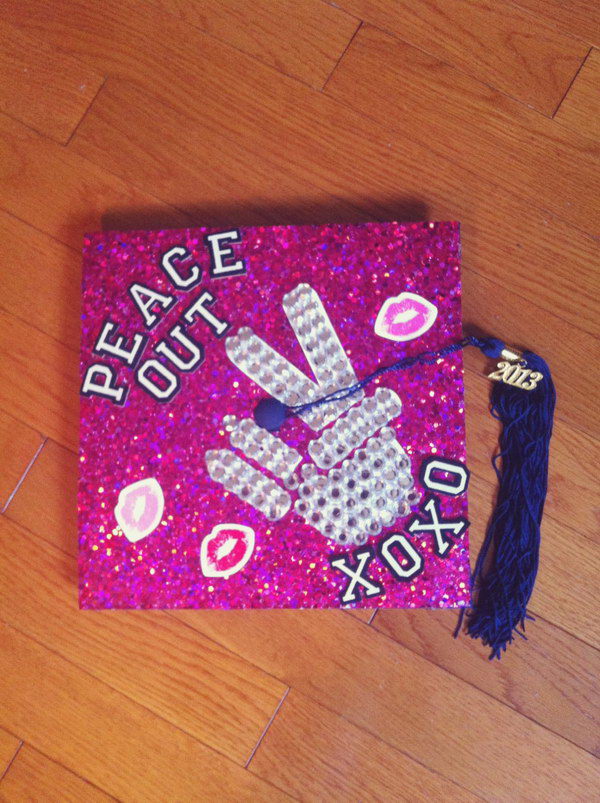 Victory Graduation Cap. This victory graduation cap is designed especially for girl graduates. It has victory gesture beadings above the glittering purple cap board. Finish off this charming cap with blue threads to create the tassel. 