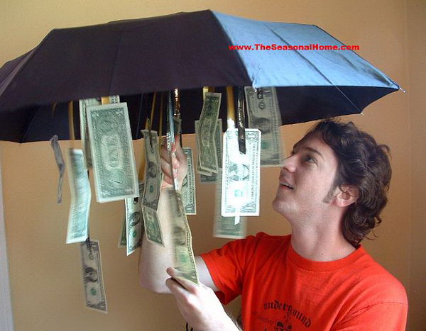 Cash Umbrella. Cut ribbons of various lengths, attach money to them and tie the ribbons inside the umbrella. The graduate must be disappointed to receive the ordinary umbrella. Once he or she opens it, the graduate must feel very exciting. I really enjoy this humorous gift.