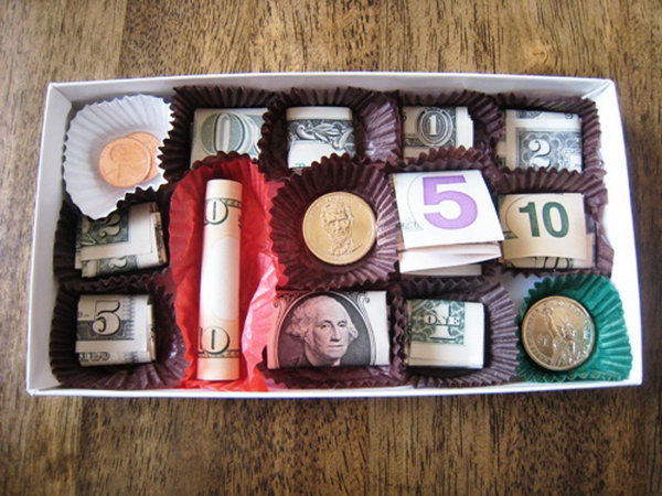 Funny Chocolate Graduation Gift. Unwrap the candy box, nestle within candy papers varied denominations as you like. Adhere the currency to the candy liner to create the sweet chocolate cash box gift to surprise the graduate.