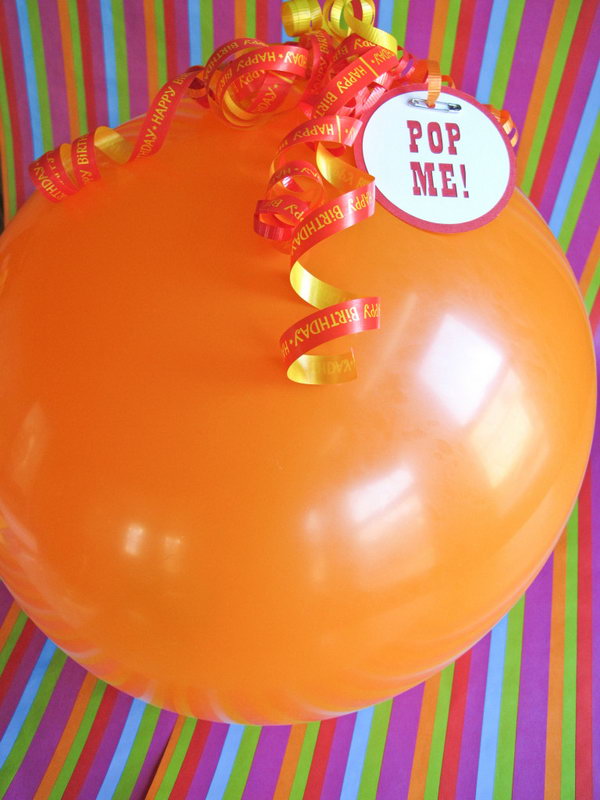 Gift Wrapping Balloon Pop. It's such a creative idea to pop a balloon to get your gift. Use balloon large enough to fit a small box or card within. It's perfect to put some sash inside. The graduate just can't wait to open this exciting gift wrapping balloon pop.