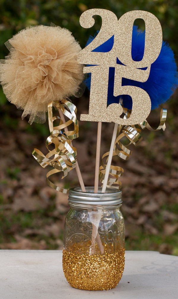 Graduation Party Centerpiece. This glittering 'Class of 2015' table centerpiece for graduation decoration will create a stunning visual effect with the gold glittering mason jar. It will shine your bright future through.