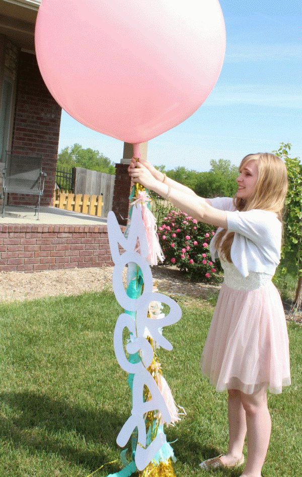 Balloon Graduation Party Decor. Decorate the balloons to your heart's content with streamers, garland, ribbons, tassels, silk flowers to dress up the top of your graduation party with a festive decor to set up the tone.