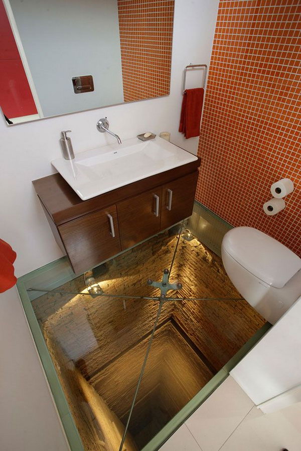 Glass floor bathroom. Having a bathroom like this will literally scare you, but it's also stimulating. If you a brave man ,you can get one .