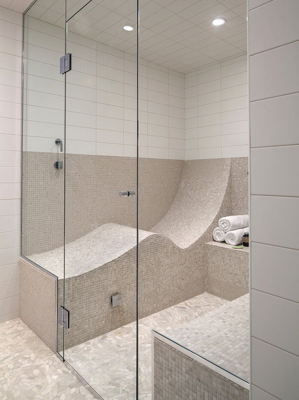 Letter S-shaped seat. An S-shaped seat turns your shower or steam room into one that you can lie down in.