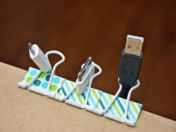 Use binder clips to organize cords. Having charging cords everywhere is always a problem. Put your binder clips on the table and keep your cords well organized.