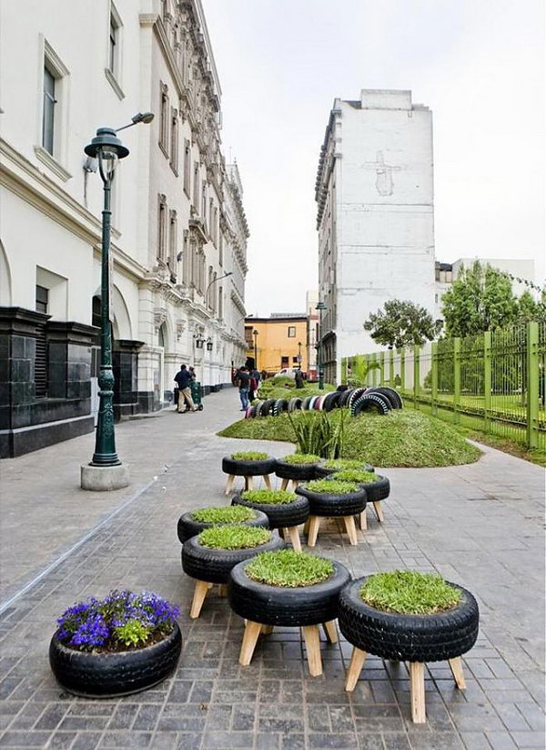 Type garden. The tyre can be a good container for the flower and grass. You should not abandon them next time. 