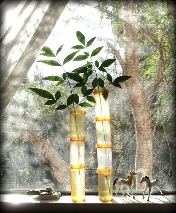 Faux bamboo vases. If you have a massive collection of empty pill bottles, don't discard them. It's a cool idea to create these faux bamboos.