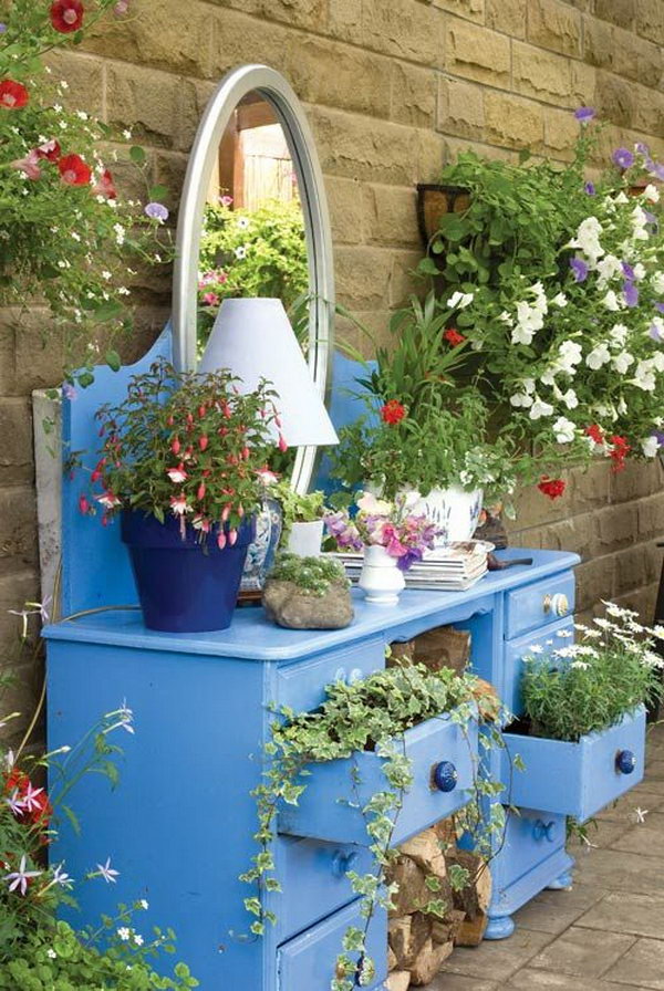 If you have an old dresser, do not just throw it away. You can give it a second life to create a multi-level flower bed. Another way, you can also use it to stage pots stones and gardening tools on the top for added interests to make your garden organized and decorate your yard.