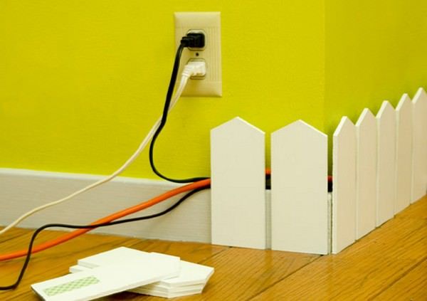 Mini Picket Fence. Use this electronic cable-organizing solution with this mini wall picket fence to serve your brilliant home decor for electronics.