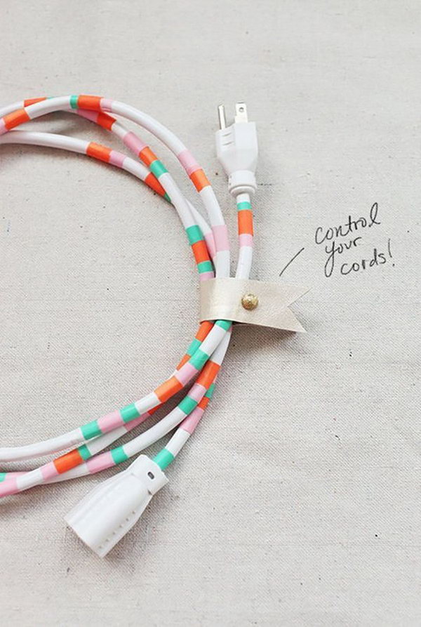 Decorative Power Cords. Create this pretty cord organizer by cutting pieces of tape, wrapping waterproof tape around the cord to finish off its fantastic outlook.