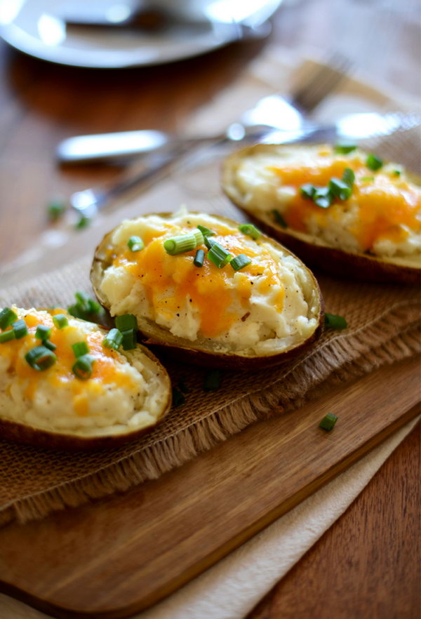 Cauliflower Twice Baked Potatoes. What a cheesy, mouthwatering twice baked potato with steamed cauliflower inside. It's perfect to serve your gusts with this vegetarian dish.