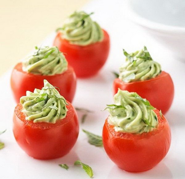Stuffed Cherry Tomatoes. Stir mayonnaise, bacon, green onion and avocado mixture. Spoon avocado mixture into scooped out tomato shells. Sprinkle some ingredients to add up perfect flavor to treat your guests. 