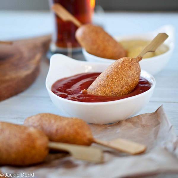Beer Battered Mini Corn Dogs. Dip the corn dogs into the batter combining flour, corn meal, sugar, baking powder, baking soda until submerged and coated.It's so fantastic to serve your late night party with this mini corn dogs.