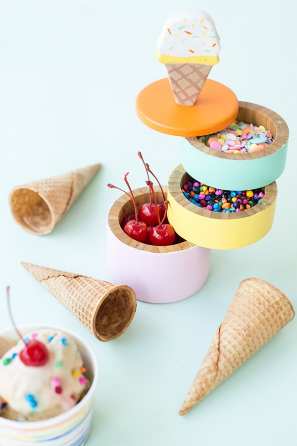Ice Cream Caddy Party Idea. DIY this ice cream caddy with 3 layers and an ice cream handle at the top. Spread the colorful candy sprinkles in each layer or the caddy. If you are an ice cream fan, this caddy would be perfect for your ice cream themed party.