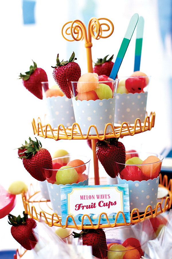 Cupcake Stand Party Idea. Try to display your food in a cupcake stand way. Put the cupcake liner inside the cup and put all your fruit in. It’s so pretty in outlook and it’s very easy and convenient to get your food.