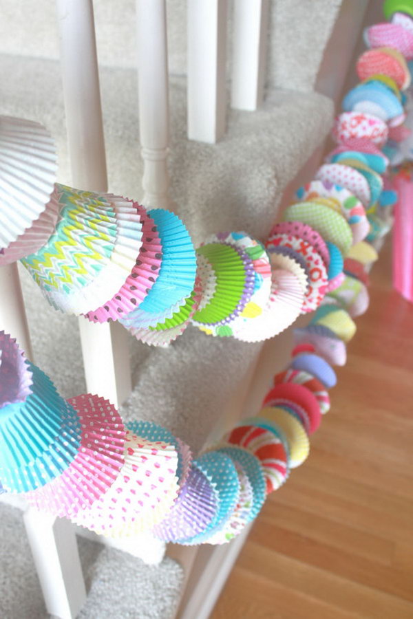 Cupcake Party Garlands. Mix large and mini cupcake liners in various colors and patterns. This handmade adorable cupcake garlands are perfect for party decoration. It works perfectly with stairwells, fireplaces, cake tables as well.