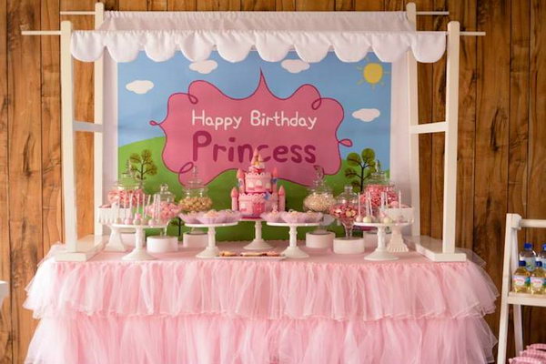 Peppa Pig Princess Party. Everything matches and compliments each other so well from the fabulous pink castle cake to the peppa pig character tissue ball decorations. So many fabulous decorations, favors, desserts and candies make the princess delightful.