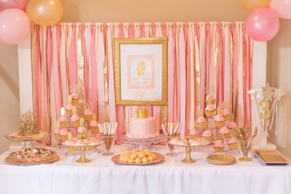 Pink and Gold Princess Party Idea. This fabulous princess party consists of pink cupcakes with gold silhouette toppers, pink cakes with gold crown, pink and shimmering gold ribbon backdrop, fabulous stands, trays and glittering gold dish bases. Any princess must be impressed by this sweet and shimmering gold accents and elegant pieces.