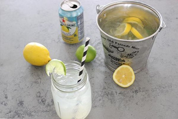 Gin Bucket. Add gin, lemon slices, and lime wheels to the ice bucket. Pour in soda, juice and syrup, distribute gin bucket into your cups filled with ice to finish off the fantastic summer time beverage recipe to whip up your summer time.