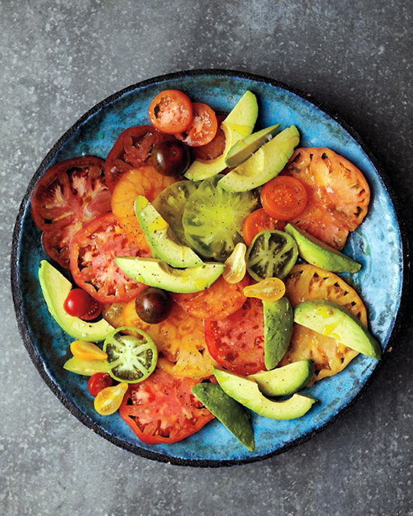 Tomatoes Summer Party Food. Display tomato slices on a plate, it's so fantastic for guests to enjoy the fresh flavor of tomatoes when they are in season.