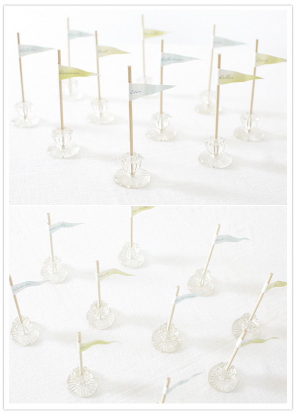 Drawer Knob Place Cards. If plants aren't your cup of tea, create this funny place holder with recycled drawer knobs for your glamorous wedding party decoration. Glue dowels together and stick into the knob. Place colorful flag tags with guests' names written.
