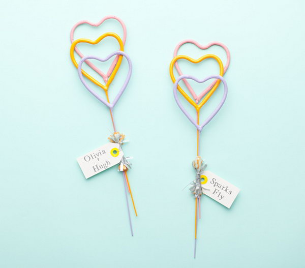 Heart-shaped Sparkles. When it comes to departure for the unforgettable wedding ceremony, distribute fireworks with these heart-shaped sparkles to enhance your elegant affair.