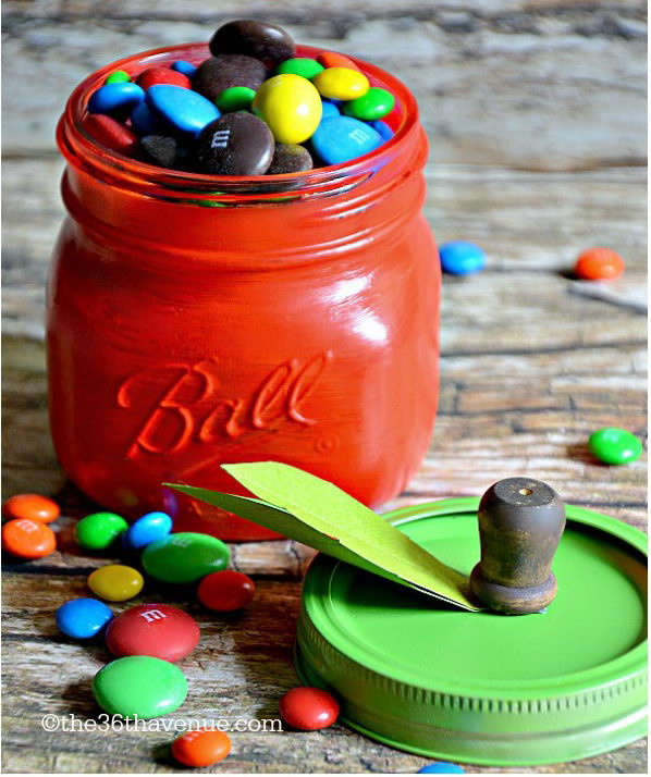 DIY Apple Jars. Get ready to paint the jar in red and ring lid in green. Add stem from wooden peg and green leaves from cardstock. With easy processes, you can turn out an amazing piece of art.