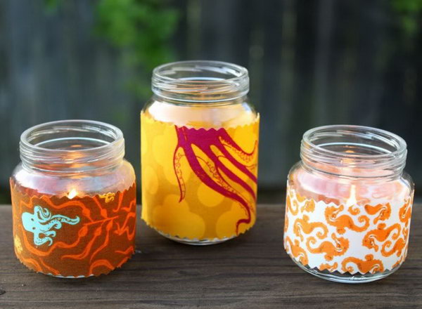 Fabric Baby Jar Votives. Transform your plain jar into an exquisite one by wrapping up the jar with beautiful patterned fabric. Place candles to finish off this adorable well-refined work of art.