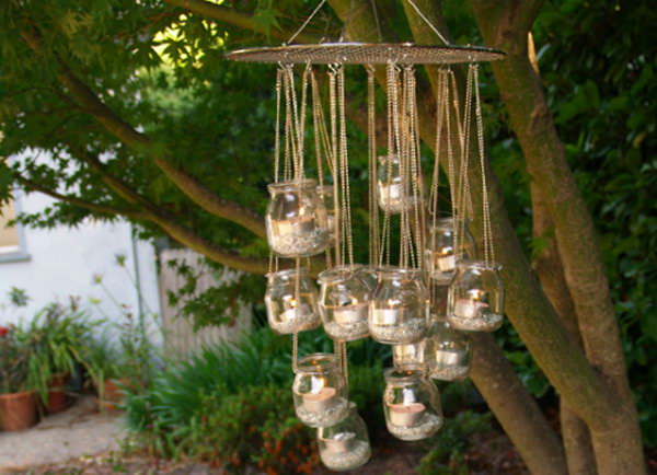 Garden Chandelier. It's super chic to add soft, eco-friendly candlelight to your garden with this beautiful chandelier made from baby food jars as well as circular cooling rack.