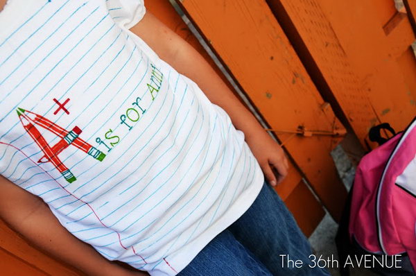 Back To School Name T-Shirt. Mark the horizontal lines with blue sharpie and the red one with red sharpie. Add some pattern with the help of vinyl. Kids must love this personalized T-shirt.