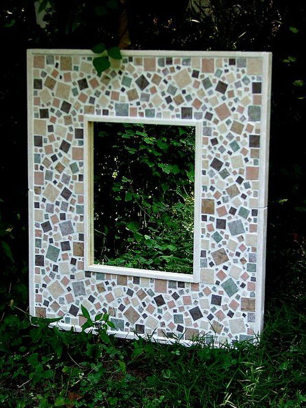 Decorative Mosaic Mirrors in the Garden Created from Ceramic Tiles, Glass and Hand-made Concrete Leaves.