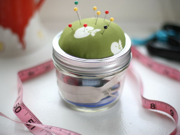 Mason Jar Sewing Kit. Stuff batting inside the lid and seal up the fabric to create the pin cushion for the lid, glue along the line of this pin cushion lid. This gift is super easy, it's cheap yet elegant.