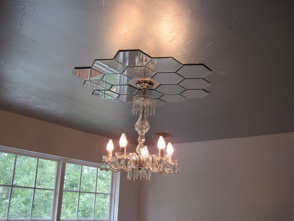  Mirrored Ceiling Medallion. This mirrored ceiling medallion looks so harmonious with the whole style of the bedroom, plus adds more elegance. With little imagination, you can make one by yourself for about $30 out of candle plates from Hobby Lobby. 